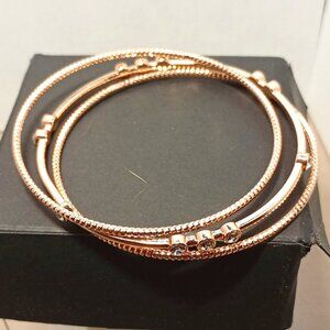 Set of Three Gold Tone Bracelets